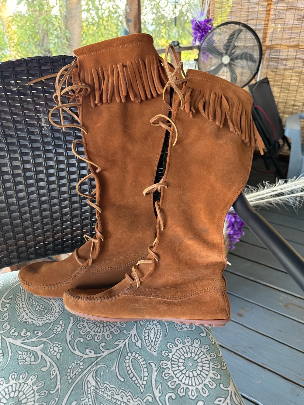 Knee-high Minnetonka suede moccasin boots